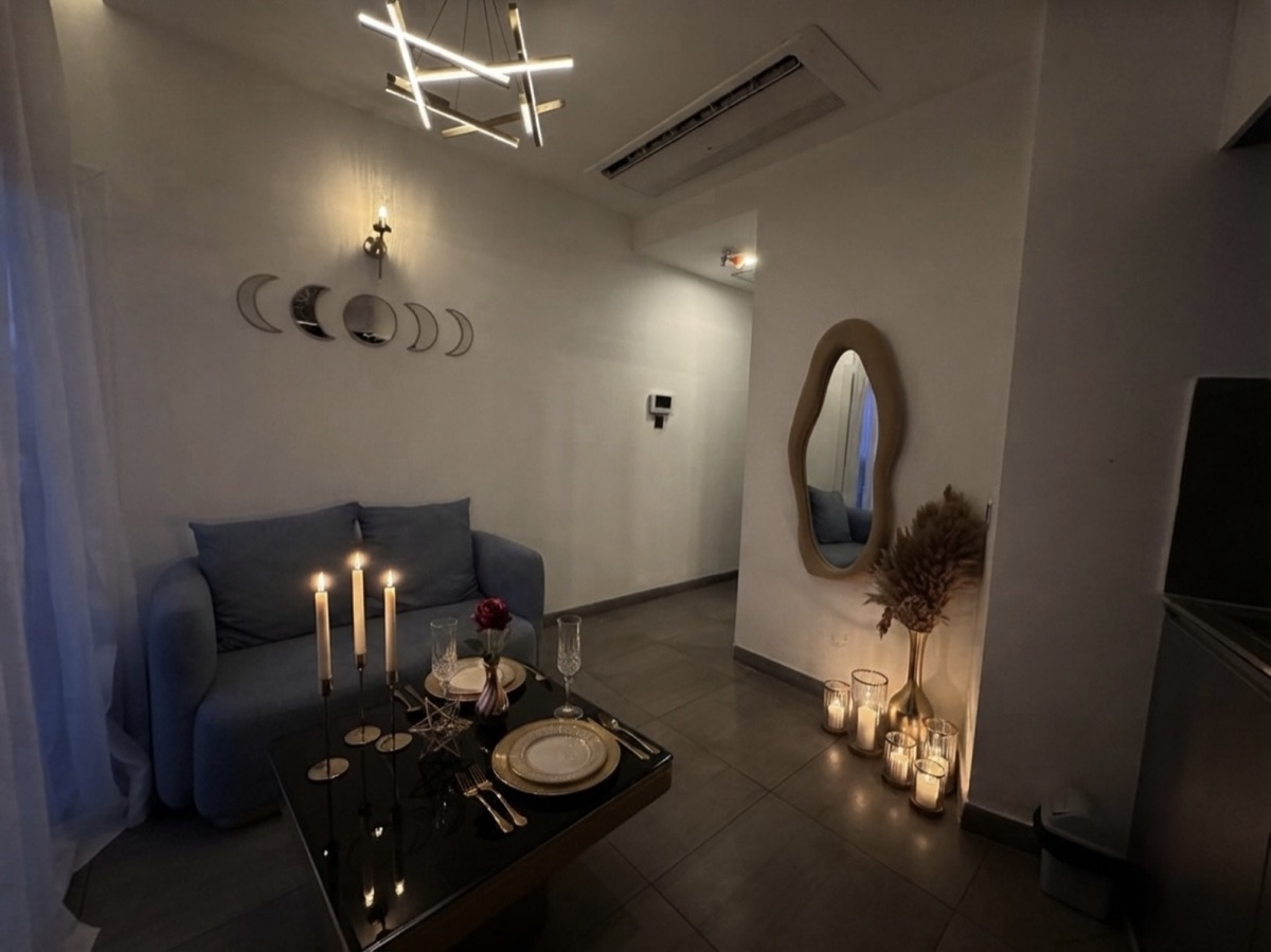 Private candlelight dinner set up inside the apartment